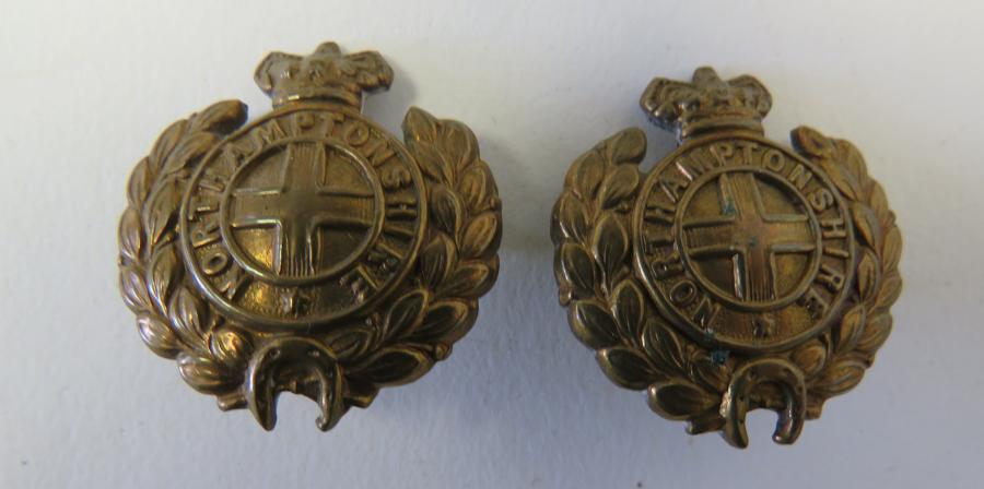 Pair of Victorian Northamptonshire Regiment Collar Badges