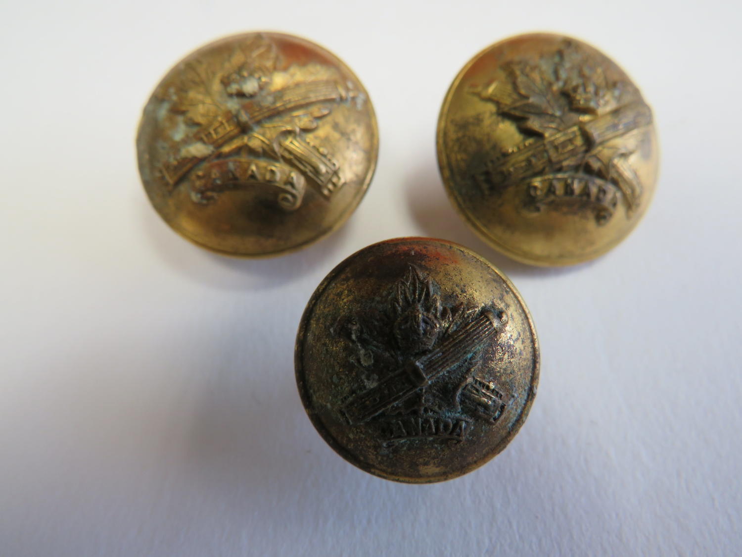 Three WW 1 Canadian M.G.C Buttons