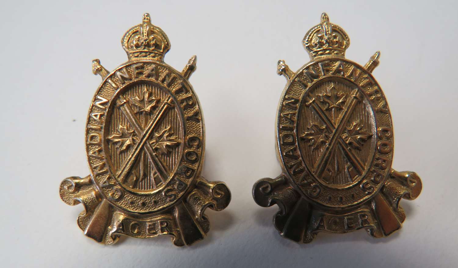 Pair of pre 1952 Canadian Infantry Corps Collar Badges