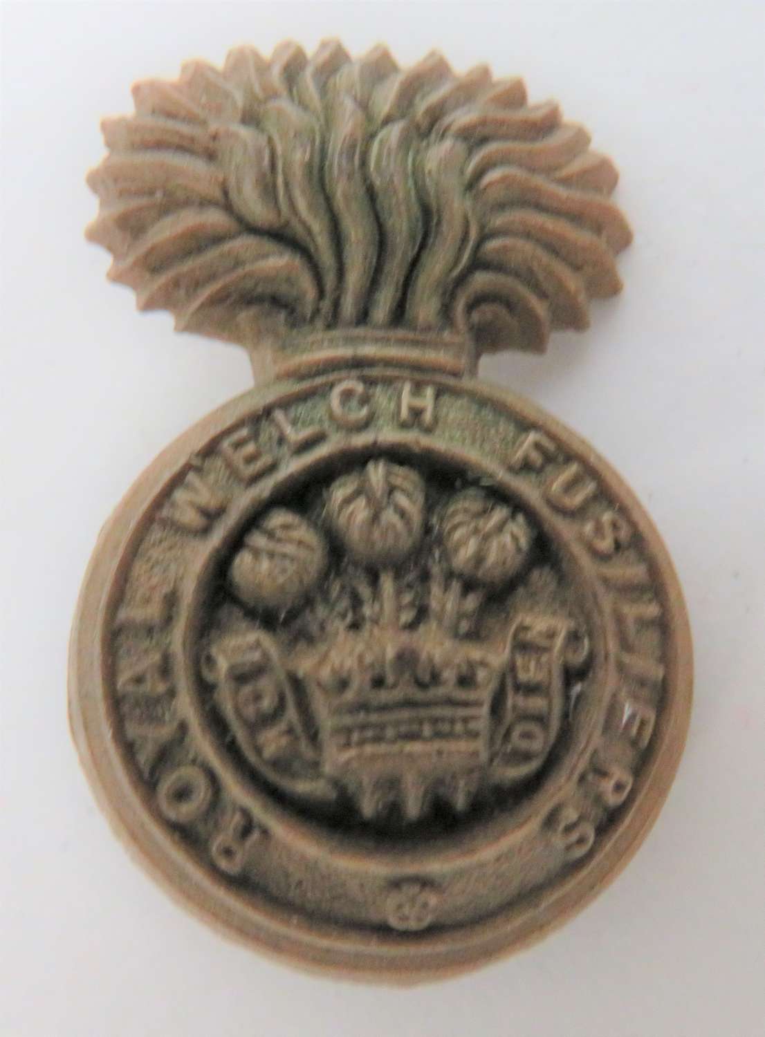 WW2 Plastic Economy Royal Welch Fusiliers Cap Badge