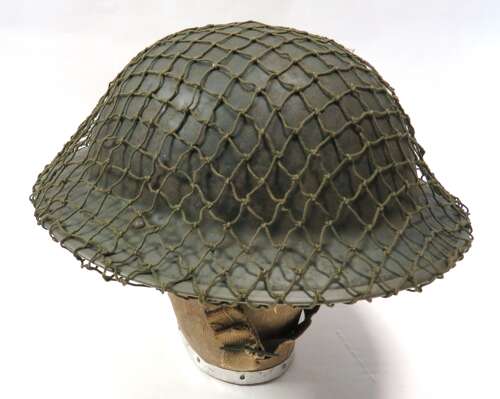 Early War Steel Helmet with camouflage Netting cover